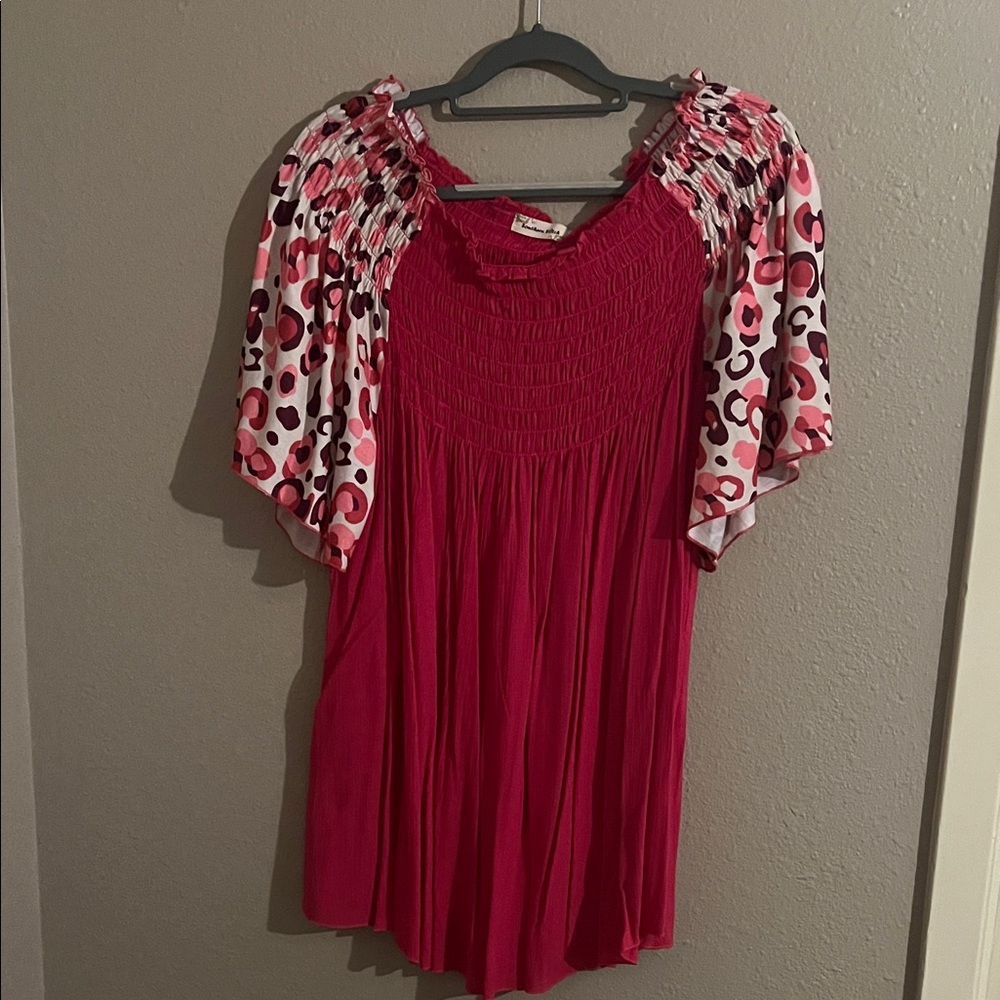 Vibrant Pink Blouse with Patterned Sleeves